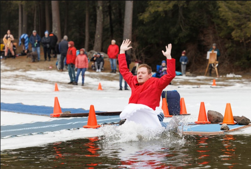Briggs Doxzen jumps into a freezing cold pond.